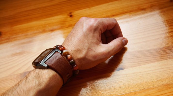 Young,Man's,Hand,With,A,Watch,And,Bracelet,Decoration,On